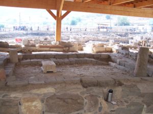 Interior of the synagogue at Magdala with the limestone table in the center surrounded by stone benches. Photographed by Joshua N. Tilton.