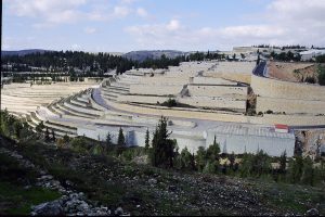 Looking down on the area of the cemetery that borders the Emmaus Road when only the foundation platforms of this area had been built. Photographed by Horst Krüger.