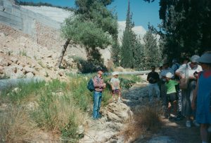 David Bivin with a tour group at the Emmaus road.