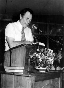 Pastor “Bob” Lindsey behind his pulpit (circa 1977).
