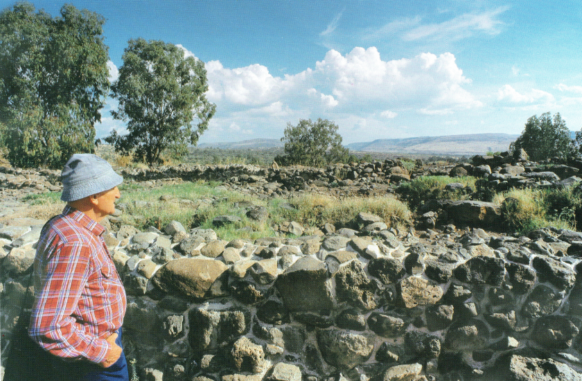 Mendel Nun surveys the Bethsaida Excavations Project's work on the mound of et-Tell.