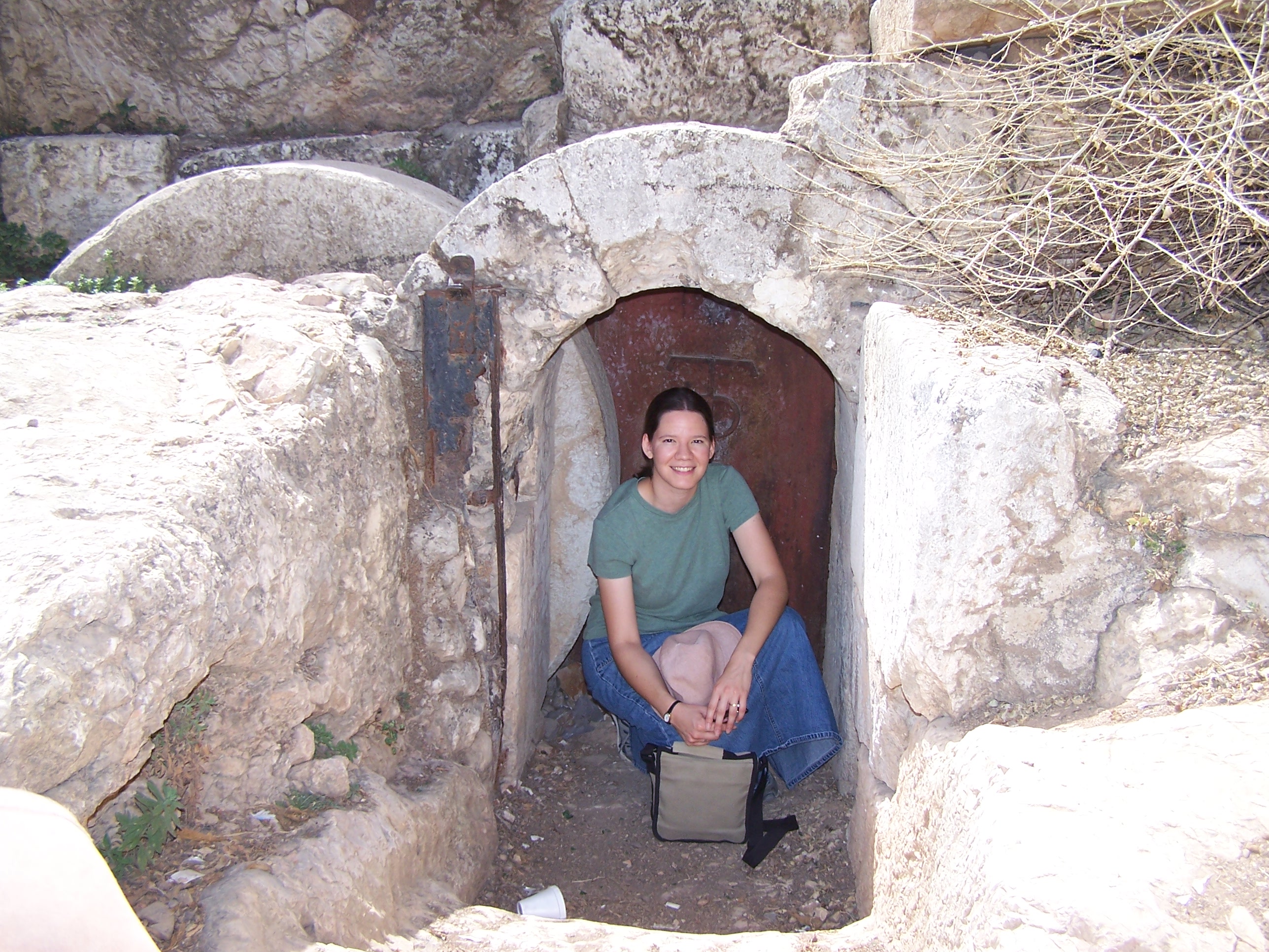 Entrance to a rock-cut tomb with a rolling stone to the west of the Old City of Jerusalem. Photo courtesy of Joshua N. TIlton.