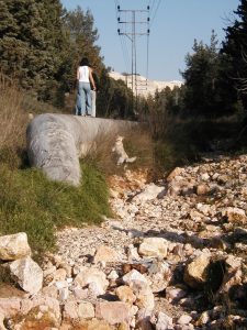 It’s now easier to walk on the water main than on the eroded road. Photographed by David Bivin.